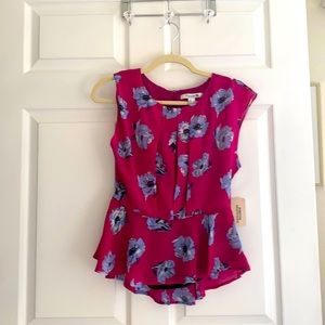 Hot pink ruffle bottom blouse